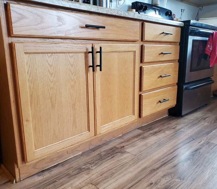 Black Handles on Oak Kitchen Cabinets