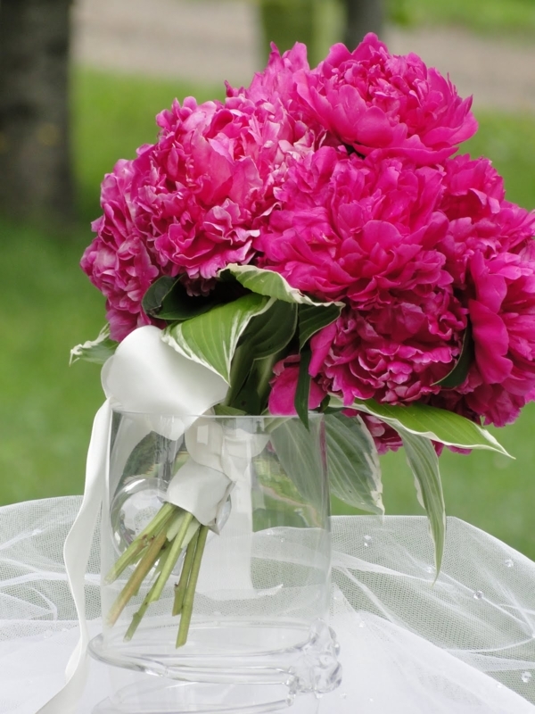 Bright Pink Peony Wedding Bouquet in Glass Vase