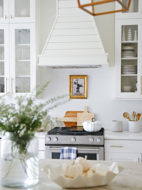 Bright White Farmhouse Kitchen with Elegant Hood
