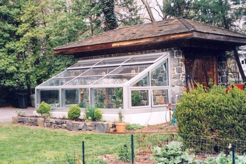 Charming Small Glass Greenhouse Attached to Shed