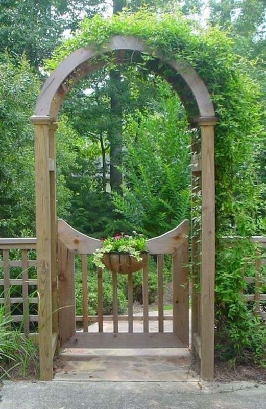 Charming Wooden Garden Archway with Greenery
