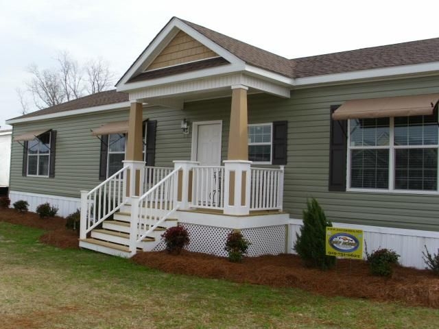 Classic Modular Home with Front Porch and Green Siding