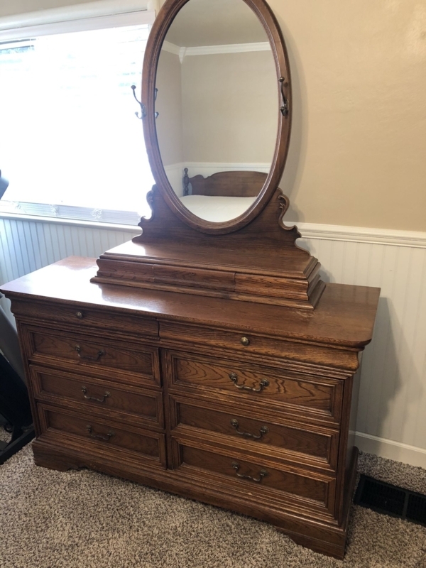 Classic Wooden Dresser with Oval Mirror