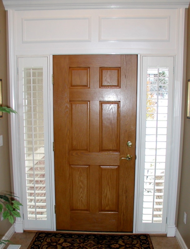 Classic Wooden Front Door with White Sidelight Shutters