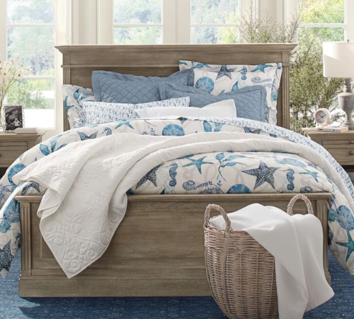Coastal Bedroom with Starfish Bedding and Rustic Wood Bed