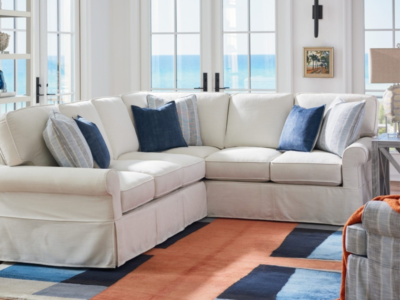 Coastal Inspired White Sectional Sofa with Blue Accents