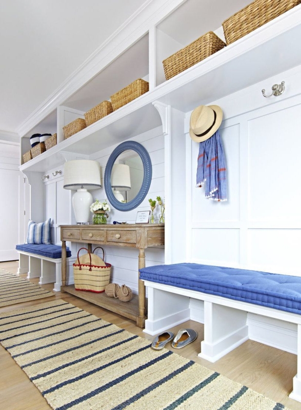 Coastal Style Entryway with Blue Cushions and Wicker Baskets