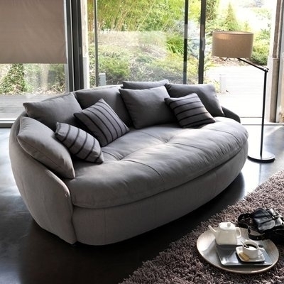 Contemporary Gray Oval Sofa with Plush Pillows