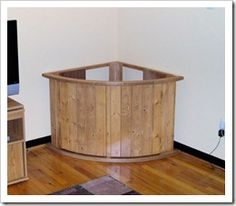 Corner aquarium with large pebbles and sloping from front to back for ...