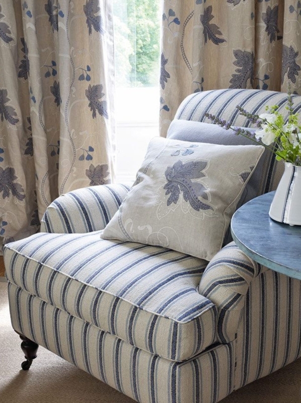 Cozy Blue Striped Armchair with Floral Accents