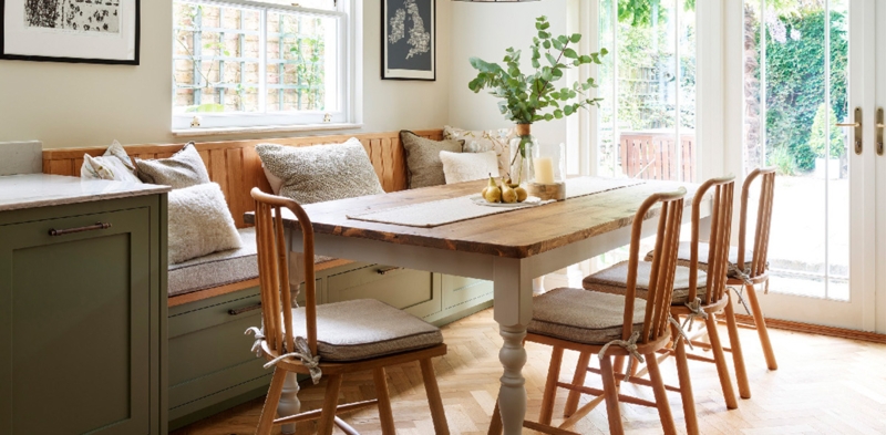 Cozy Built-In Kitchen Booth with Rustic Wooden Table