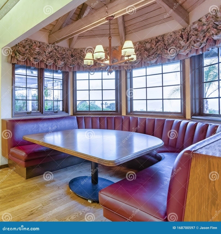 Cozy Corner Kitchen Booth Seating with Large Windows