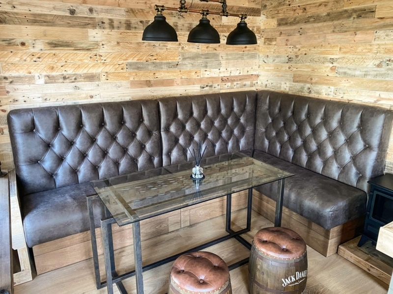 Cozy Home Bar Booth with Rustic Wood Walls