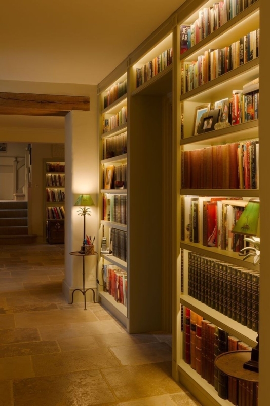 Cozy Home Library with Warm LED Shelf Lighting