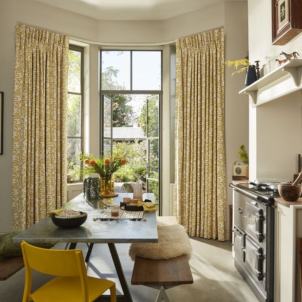 Cozy Kitchen with Chartreuse Patterned Curtains