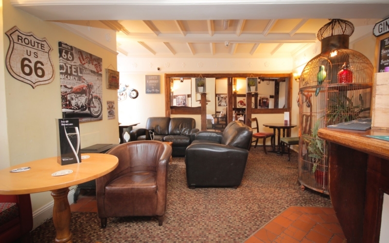 Cozy Leather Bar Sofas in Vintage Pub Interior
