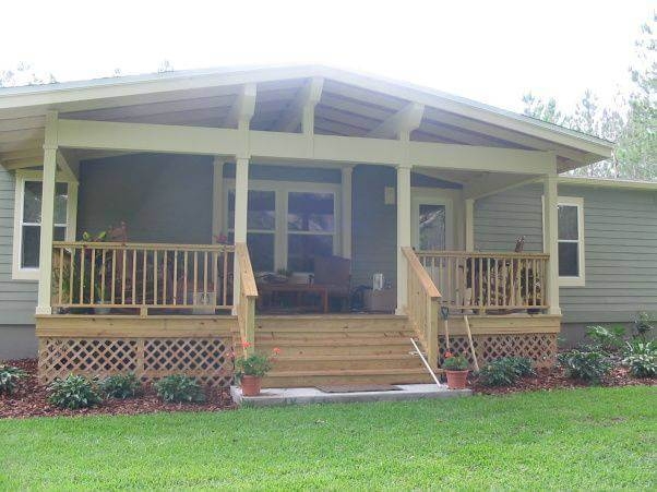 Cozy Manufactured Home Porch with Wooden Railings
