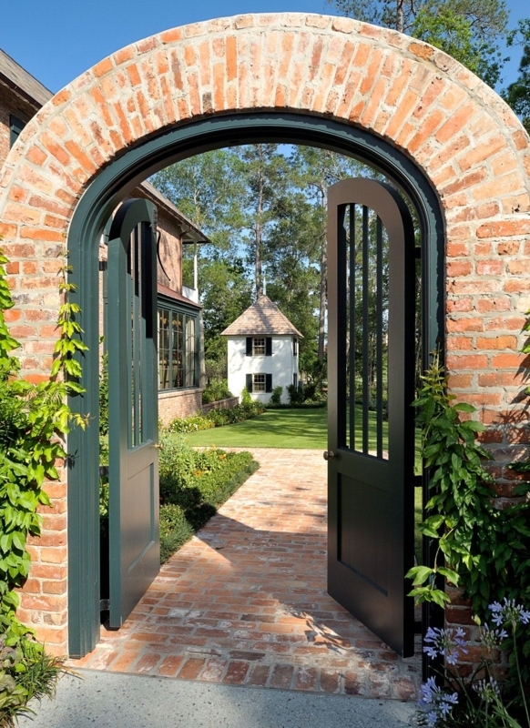 Creole Garden Gate with Arched Brick Entrance
