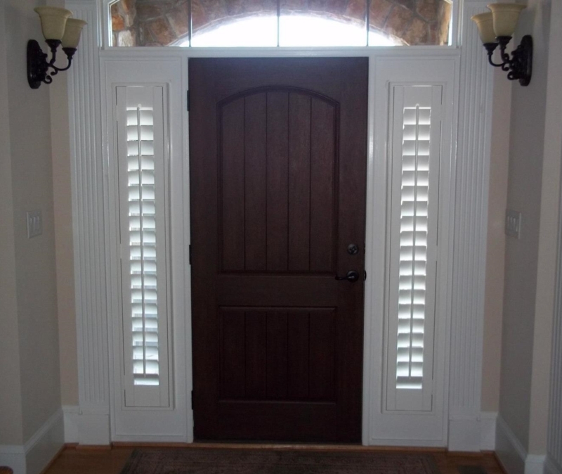 Dark Wood Front Door with White Plantation Shutters