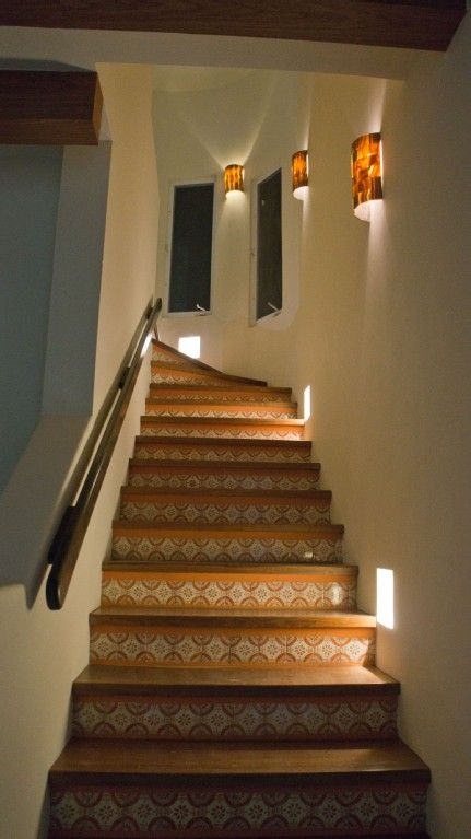 Decorative Tiled Staircase with Warm Ambient Lighting