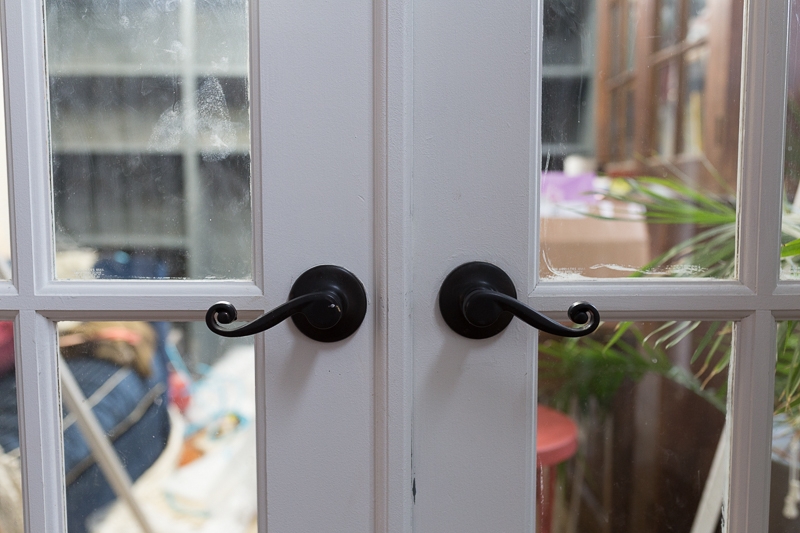 Elegant Black Hardware on White French Doors