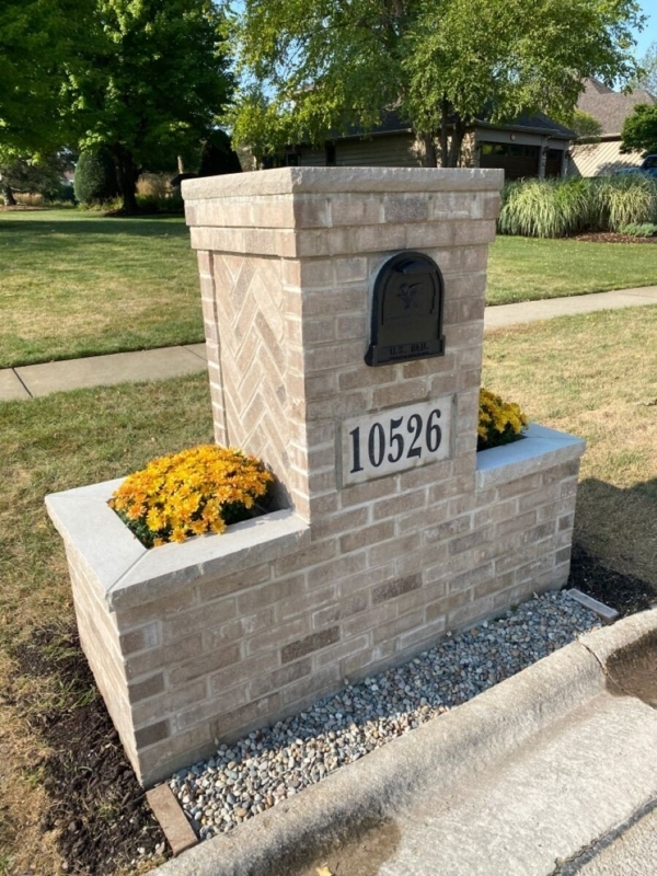 Elegant Brick Mailbox with Flower Planters