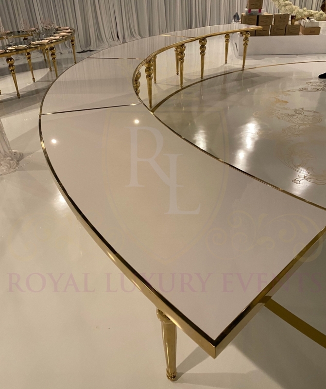Elegant Curved Gold Trimmed Circular Tables