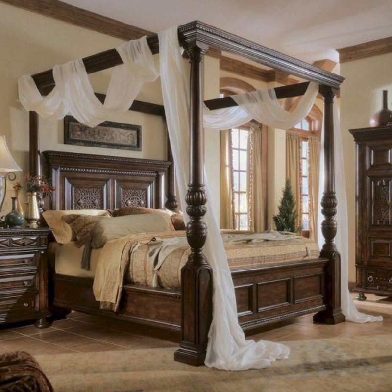 Elegant Dark Wood Canopy Bed in Romantic Bedroom