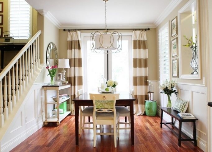 Elegant Dining Room with Bold Striped Curtains