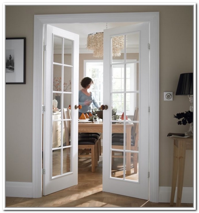 Elegant French Door Knobs in Bright Dining Room