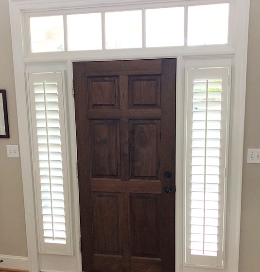 Elegant Front Door with White Sidelight Shutters