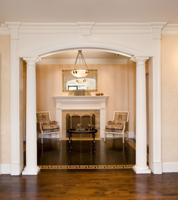 Elegant Greek Revival Suite with Arched Openings and Columns