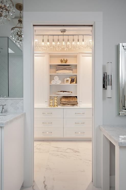 Elegant Linear Crystal Chandelier in Walk-In Closet