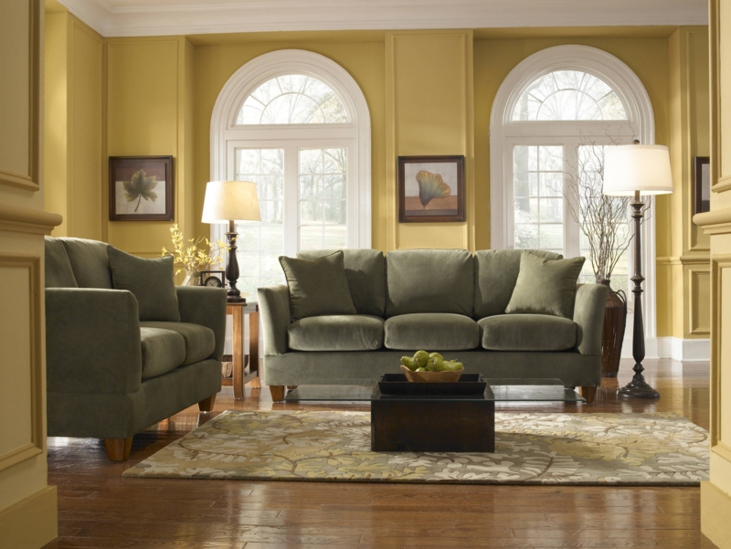 Elegant Living Room with Sage Green Sofa and Warm Tones