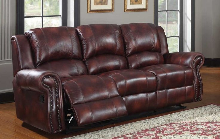 Elegant Maroon Leather Reclining Sofa in Living Room