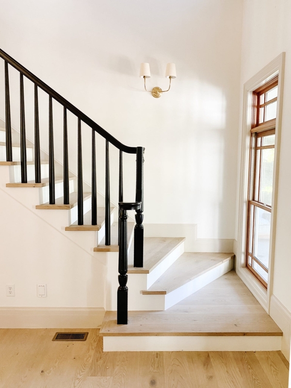 Elegant Minimalist Stairwell with New Wall Sconces