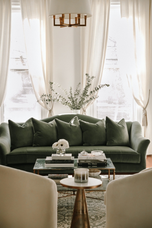 Elegant Sage Green Velvet Sofa in Bright Living Room