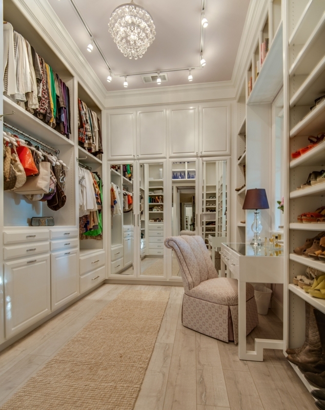 Elegant Small Walk-In Closet with Chic Lighting