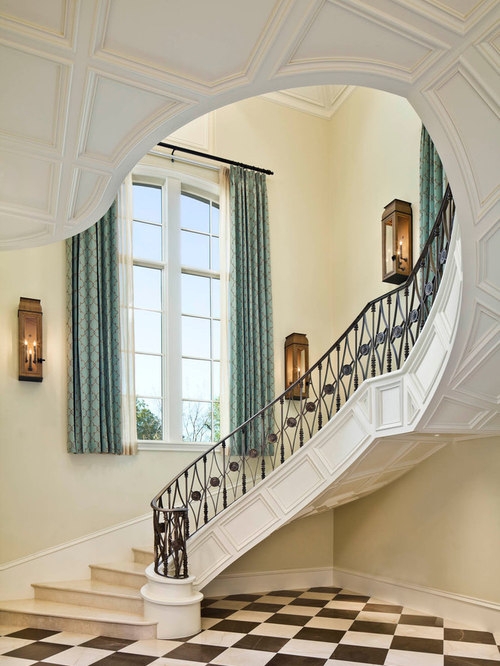 Elegant Stairwell with Classic Wall Sconces