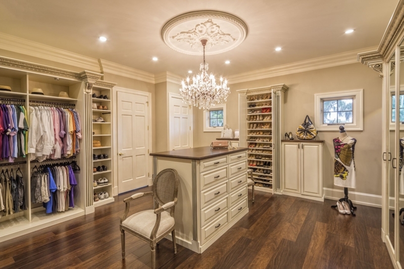 Elegant Walk-In Closet with Classic Lighting