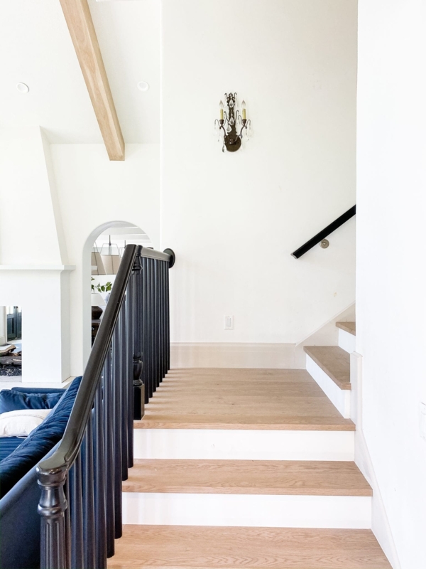 Elegant Wall Sconce Lighting in Modern Stairwell