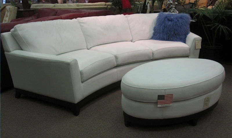 Elegant White Curved Sofa with Oval Ottoman