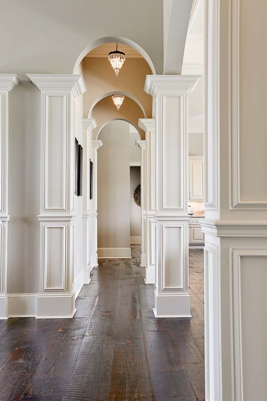 Elegant White Interior Columns with Arched Ceilings