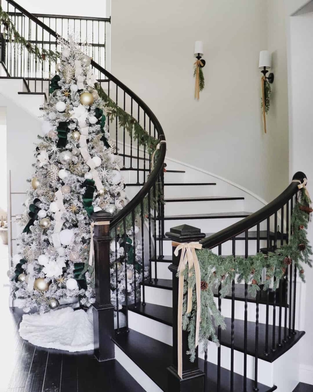 Festive Christmas Staircase with Elegant Wall Sconces