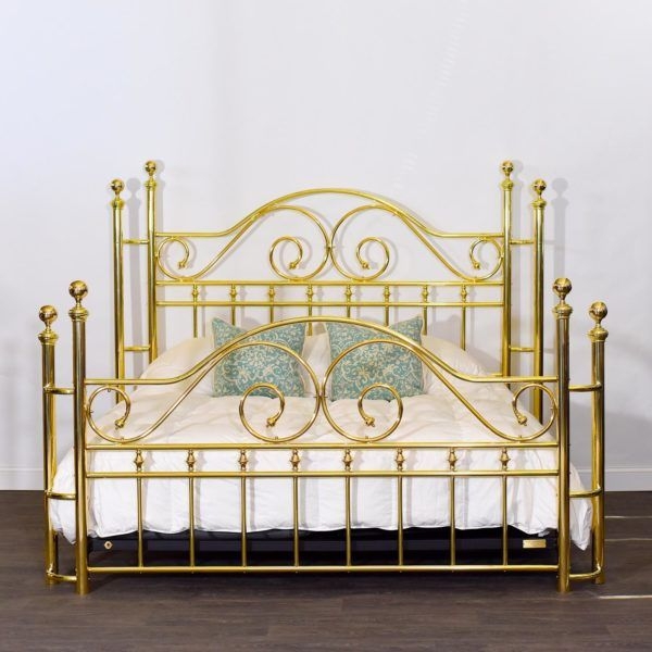 Handcrafted graceful brass scrolls and double wrap posts give this ...