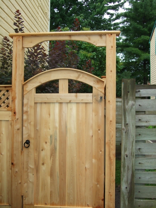 Lovely arched pre made cedar gate with matching gate brace. Supplied ...