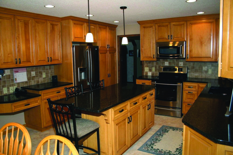 Maple Kitchen Cabinets with Black Granite Countertops