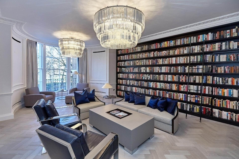 Modern Home Library with Elegant Wall Lighting