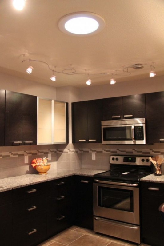 Modern Kitchen with Track and Ceiling Lighting