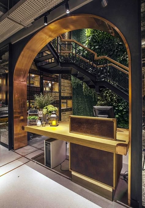 Modern Restaurant Hostess Stand with Natural Elements